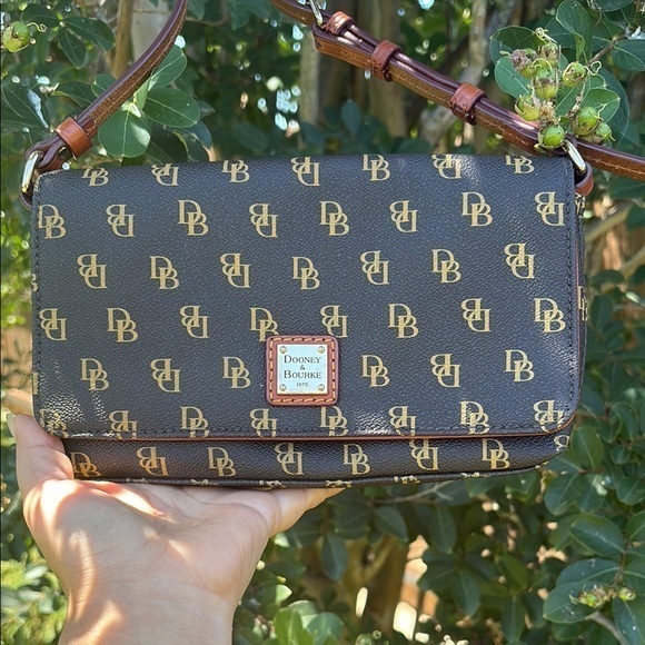 Dooney & Bourke Handbags - Dooney & Bourke Black and Gold Monogram Bag used twice.